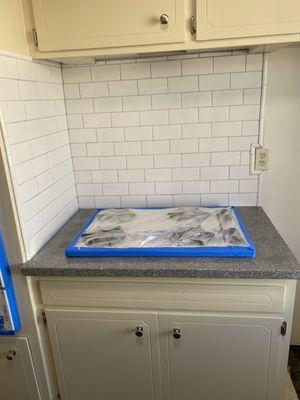 counter top, tile and stove