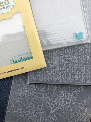 Top two are regular embossing folders, bottom two are 3D embossing folders.