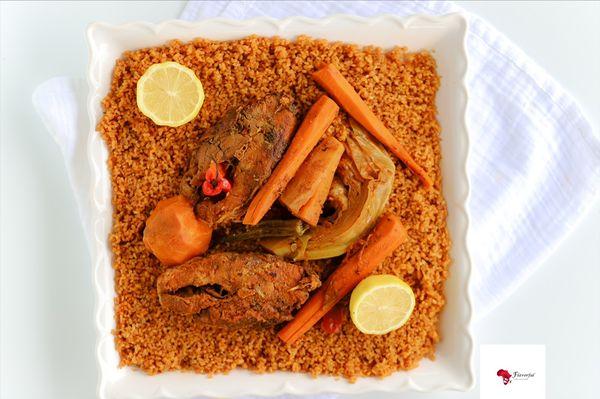 Thieboudiene: rice and fish with savory vegetables.