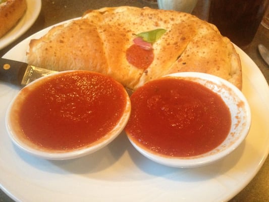 Calzone wit extra sauce.