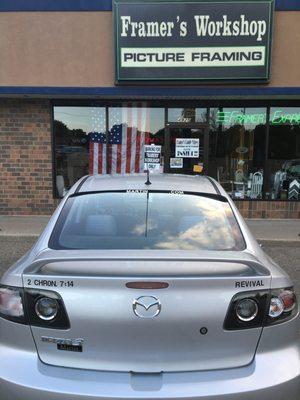 the front of my shop and my Christian car.