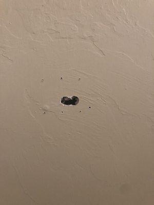 Holes left courtesy of ADT, as they stated to the better business bureau, these are "standard".