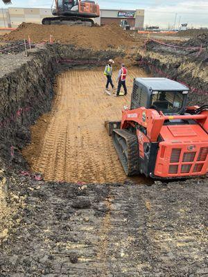 Excavating to begin moisture conditioning.