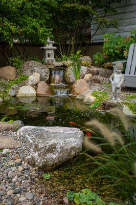 Pond with Waterfall and Fountain.