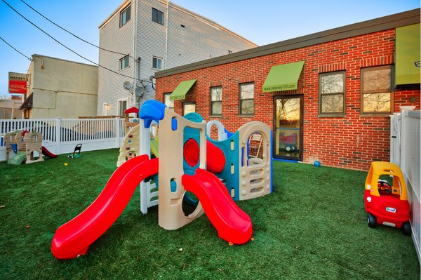 Our spacious, secure and inviting playground.