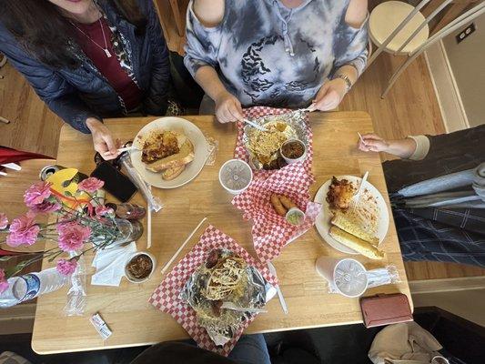 Cachapas, taqueños, and pasticho, oh my  Drinks are maltín and papelón con limón