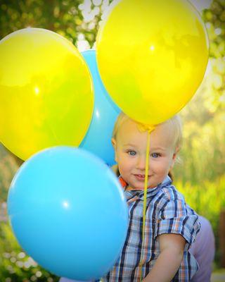 Baby and balloons