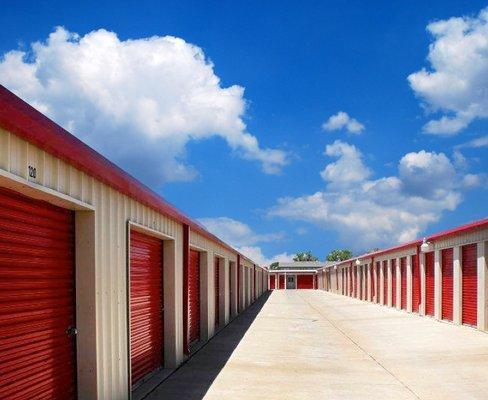 Outdoor drive up storage units; Large driveways for multiple vehicles, all well-lit at night for your safety and protection.