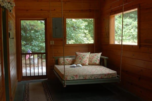 Romantic Creek Cabin Swinging Bed