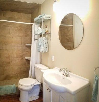 New modern bathroom with large shower inside the HA Whitney Inn, Columbus, Wisconsin