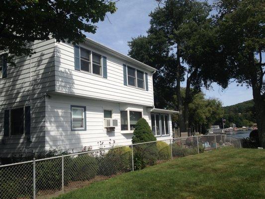 Aluminum restoration of this dated lake front made it a water front delight.