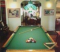 Billiard table in common area for guests to enjoy.