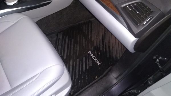 new acura mdx,  flooded floor after rain