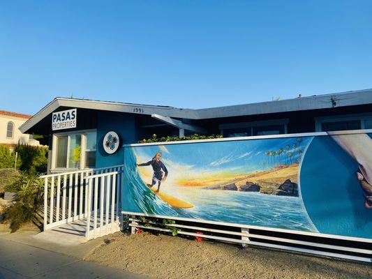 Surfer girl Sunset Cliffs mural art in Ocean Beach San Diego OBSD