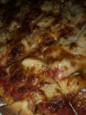 Tuesday special Large 2 topping pizza $11.95. This is chicken and cheese