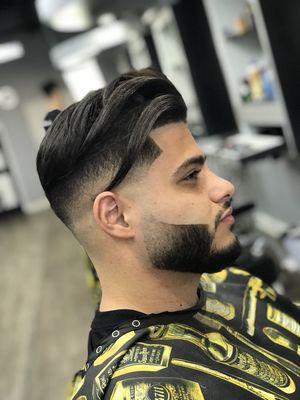 Mid Fade with h faded beard