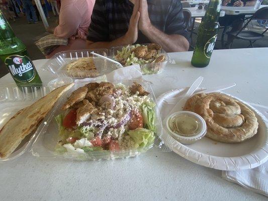 Greek beer, two open chicken souvlaki and spanakopita