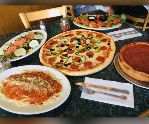 Large veggie salad - wing special- Large thin crust pizza- spaghetti with meatballs- stuffed pizza in the pan