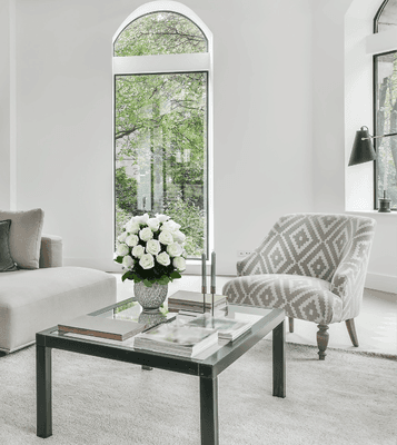 Close-up of a vibrant floral arrangement in a spotless room, highlighting Clean & Flowers' signature post-cleaning elegance.