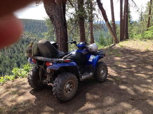 Overlooking a nearby canyon. This shows their 2 seater atv. They also have 2 seater side by sides for a little extra.