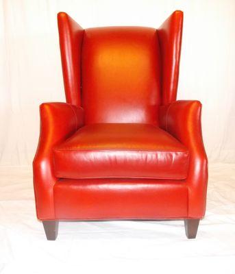 Eye-catching leather wing chair.