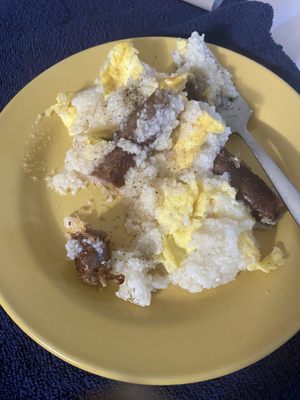 Beef sausage (tasted great) with scrambled eggs and grits