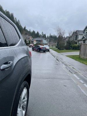 911 driving school teaches kids how to park blocking my driveway. It is Illegal to park in such a way that you block the driveway.