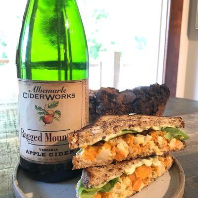 Roasted cauliflower and sweet potato sandwich with brie, and horseradish hummus. Just messing around with a Saturday special and Ciderworks.