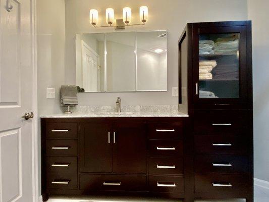 60-in. vanity, 6-ft. linen tower, triple recessed medicine cabinet.