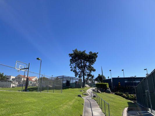 Long path way to the pickleball courts