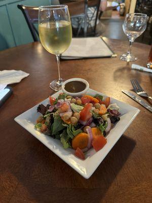 Fresh garden salad with balsamic vinaigrette wonderful and a very tasty light white Italian wine