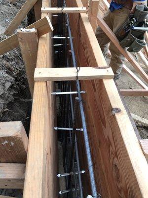 Typical retaining wall formwork with reinforcing steel.