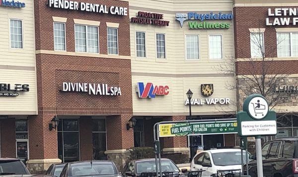 Storefront of Virginia ABC Store tucked away in the Harris Teeter shopping ccenter