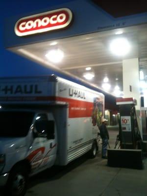 Uncle Gary fills up the truck in preparation for tomorrow's last leg of the trip to St. Maries.