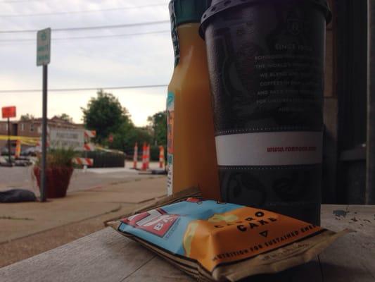 Early morning bench breakfast: coffee, orange juice, and Clif bar. Yuss.