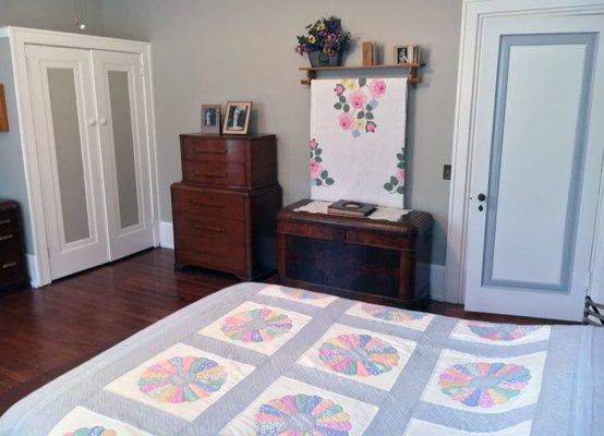 Room #3 features several heirloom quilts