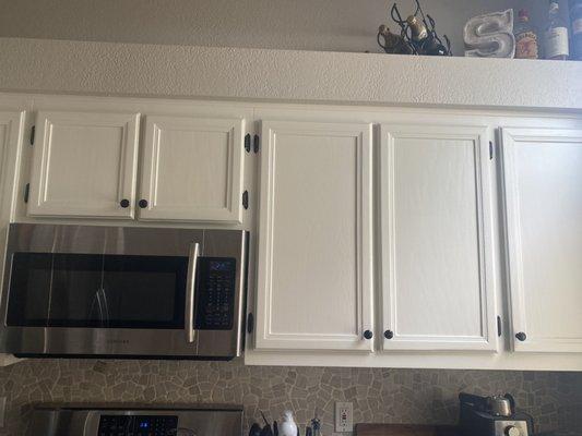 Kitchen cabinet painting and hardware installed