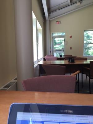 View from one corner of the library! Long tables with outlets :)