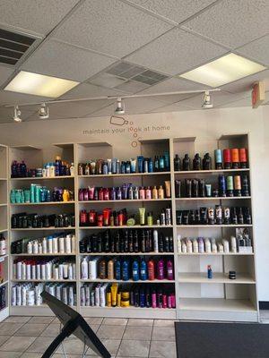 The shelves with products available for purchase at a Hair Cuttery Salon.