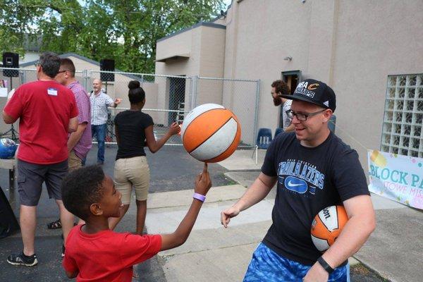 Neighbors and volunteers enjoy our monthly block parties!