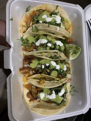 Chicken tinga on left, and 3 al pastor tacos