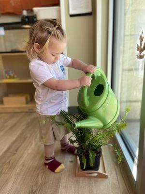 Caring for plants at just 22 months!