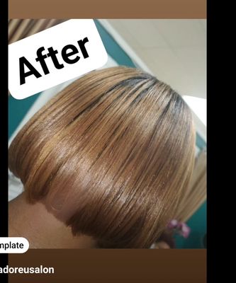 Healthy blonde dark roots with lighter highlights.  Bob cut!