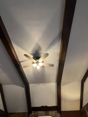 Interior ceiling skim coated and finish paint with stained beams