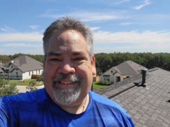 Home Inspector, inspecting a roof in Bastrop Texas