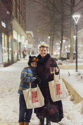 Phoebe, with her son Isaak, at Iowa City's Downtown Cocoa Crawl.