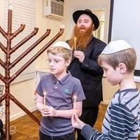 Children lighting the Menorah  at  the B J C .