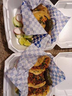 Pollo (top) and al pastor tacos