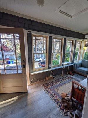 Porch/sunroom with FoldUp windows installed.