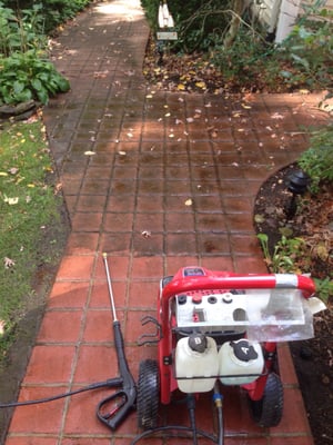 Power washing to restore the look on a home.